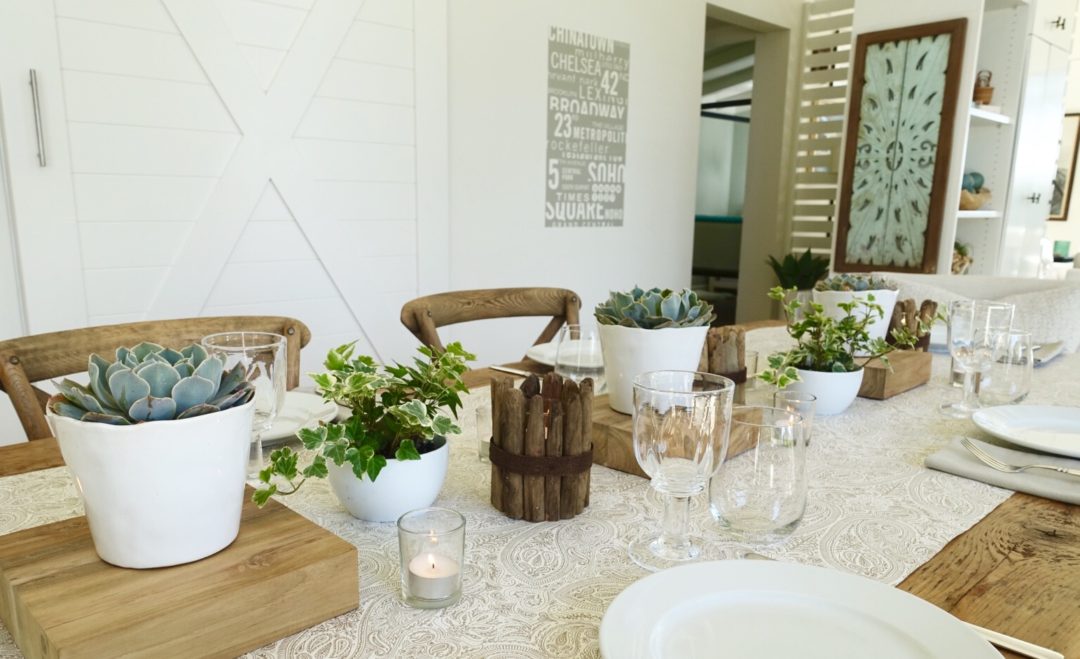 table setting with succulents and ivy